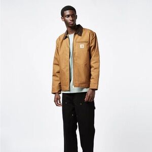 CARHARTT WORK IN PROGRESS
Hamilton Brown OG Detroit Jacket
